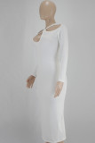 クリームホワイトのセクシーなソリッド中空パッチワーク非対称襟ワンステップスカートドレス