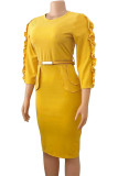 黄色のファッションカジュアルソリッドパッチワークベルト付きOネックドレス