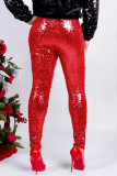 Pantaloni attillati con paillettes con paillettes tinta unita rossa alla moda