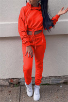 オレンジファッションカジュアルソリッド包帯フード付き襟長袖XNUMXピース