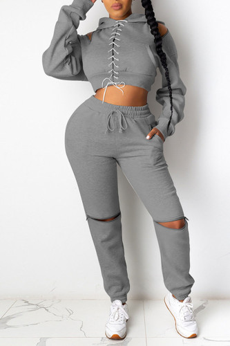Grey Sexy Solid Bandage Patchwork Backless Zipper Hooded Collar Long Sleeve Two Pieces