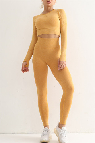 Gele casual sportkleding effen patchwork skinny topbroek met lange mouwen, tweedelige set
