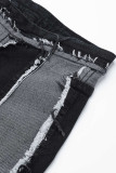 Denim de cintura media con patchwork callejero gris