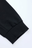 Robe t-shirt décontractée noire à imprimé patchwork à col rond