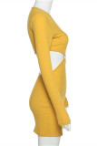 Vestidos de manga larga con cuello en V ahuecados sólidos sexy de moda amarilla