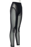 Schwarze, sexy, solide, durchsichtige Patchwork-Bleistift-Patchwork-Hose mit mittlerer Taille