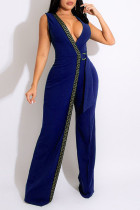 Bunte, blaue, sexy, elegante Patchwork-Overalls mit Gürtel und V-Ausschnitt