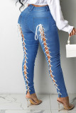 Deep Blue Sexy Street Solid Bandage ausgehöhlte Patchwork-Denim-Jeans mit hoher Taille
