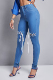 Medium Blue Street Solid Bandage Hollowed Out Patchwork High Waist Lace Up Denim Jeans