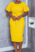 Vestidos de falda de lápiz de cuello redondo de vendaje sólido casual de moda amarilla