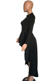 Robe noire à manches longues asymétrique à col rond et à la mode décontractée