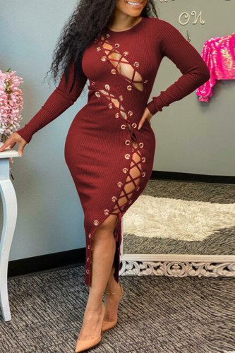 Burgundy Fashion Sexy Solid Hollowed Out Frenulum O Neck Long Sleeve Dresses