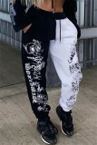 Zwart-witte mode-casual graffiti-patchwork-broek met normale hoge taille
