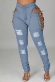 Babyblaue, sexy, lässige, solide, ausgehöhlte Frenulum-Denim-Jeans mit mittlerer Taille
