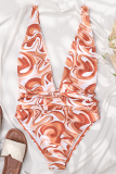 Оранжевые купальники в стиле пэчворк с сексуальным принтом