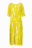 Vestidos amarelos estilo britânico estampado patchwork assimétrico com gola redonda