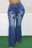 Hellblaue, modische, lässige Schmetterlingsdruck-Basic-Jeans in Übergröße