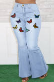 Vaqueros básicos de talla grande con estampado de mariposa casual de moda azul claro