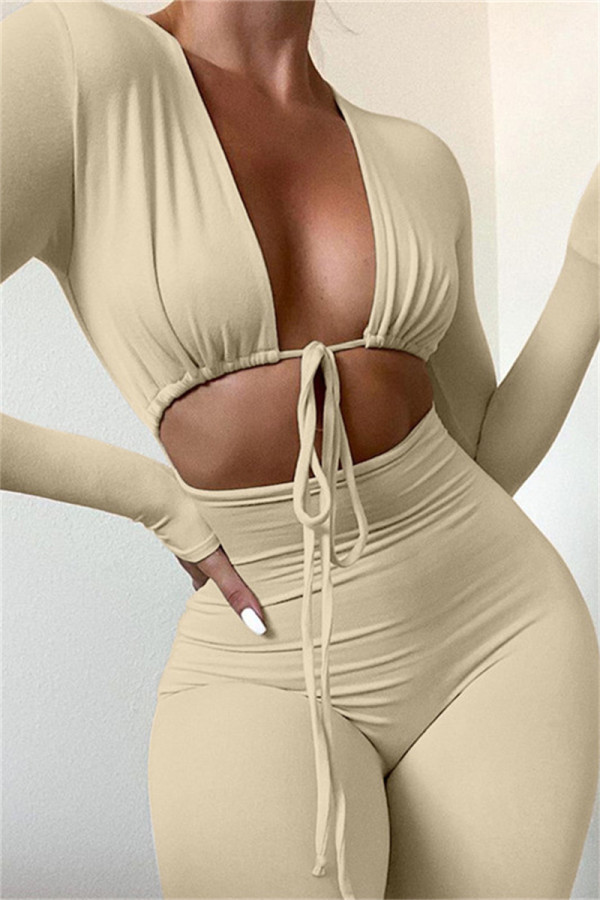 Apricot Sexy Casual Solid Bandage Ausgehöhlter V-Ausschnitt Skinny Jumpsuits