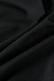 Top corto asimétrico de manga larga con cuello de un hombro en negro Sólido