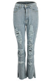 Calças retas jeans azul claro com botão sem mangas e buraco alto de retalhos simples calças retas
