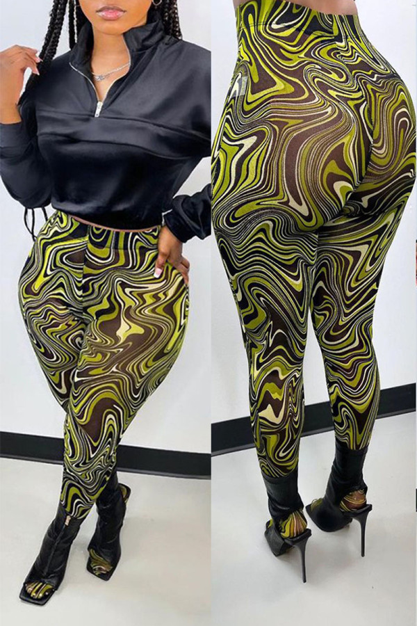 Pantaloni skinny a vita alta con stampa patchwork verde Street. Pantaloni con stampa completa