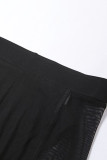 Due pezzi senza maniche trasparenti con tasca patchwork solida nera sexy