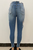Helle, zerrissene Street-Jeans aus Patchwork-Jeans mit hoher Taille und normaler Passform