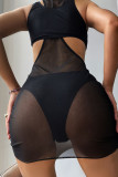 Schwarze, sexy, solide, ausgehöhlte, durchsichtige, asymmetrische Patchwork-Badebekleidung