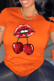Camisetas con cuello en O de patchwork con estampado de calle de moda naranja