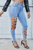 Baby Blue Sexy Street Solid Bandage Hollowed Out Patchwork High Waist Skinny Denim Jeans