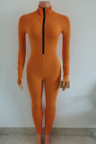 オレンジセクシーなソリッドジッパーパッチワークOネックスキニージャンプスーツ