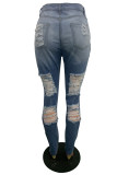 Jeans de mezclilla ajustados de cintura media rasgados sólidos casuales de moda azul