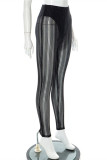 Pantalones de lápiz de cintura alta flacos transparentes ahuecados de patchwork sexy de moda negro