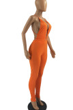 Orange Sexy Solid Patchwork Frenulum Backless Regular Jumpsuits