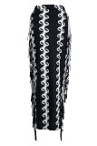 Zwarte mode-casual print met kwastjes en patchwork, normale rok met hoge taille