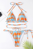 Blaue orange Art- und Weisereizvolle Druck-Verband-rückenfreie Badebekleidung