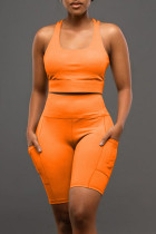 オレンジ色のセクシーなカジュアルスポーツウェアソリッドバックレスUネックノースリーブツーピース