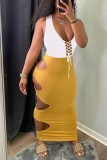 Vestidos de falda de un paso con cuello en V de frenillo de retazos ahuecados sólidos sexy amarillo