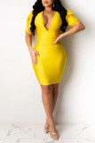 Yellow Sexy Solid Patchwork V Neck One Step Skirt Dresses