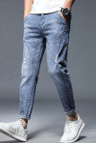 Jeans jeans azul casual rasgado com patchwork de cintura média