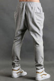 Graue, lässige, einfarbige Harlan-Hose mit mittlerer Taille und Patchwork-Tasche