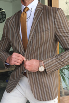 Bruine mode gestreepte patchwork knopen bovenkleding met omslagkraag