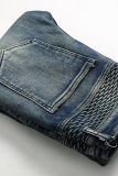 Il patchwork di strada blu da cowboy crea vecchi pantaloni pieghevoli