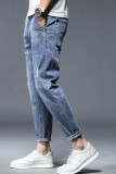 Blauwe casual gescheurde oude patchwork jeans met halfhoge taille