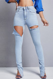 Jeans skinny in denim skinny a vita alta con fessura strappata tinta unita casual alla moda azzurro