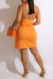 Tangerine Sexy Solid Patchwork Backless V Neck One Step Skirt Dresses