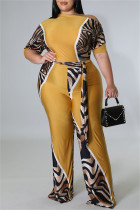 黄色のファッションカジュアルプリント包帯斜めの襟プラスサイズのジャンプスーツ