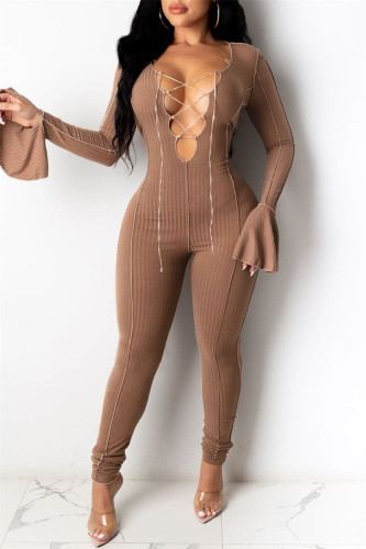 Coffee Fashion Casual Solid Hollowed Out Patchwork V Neck Skinny Jumpsuits