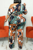 オレンジ色のファッションカジュアルプリント包帯斜めの襟プラスサイズのジャンプスーツ